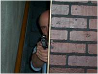 Firearms Instructor Behind Wall as Partial Cover